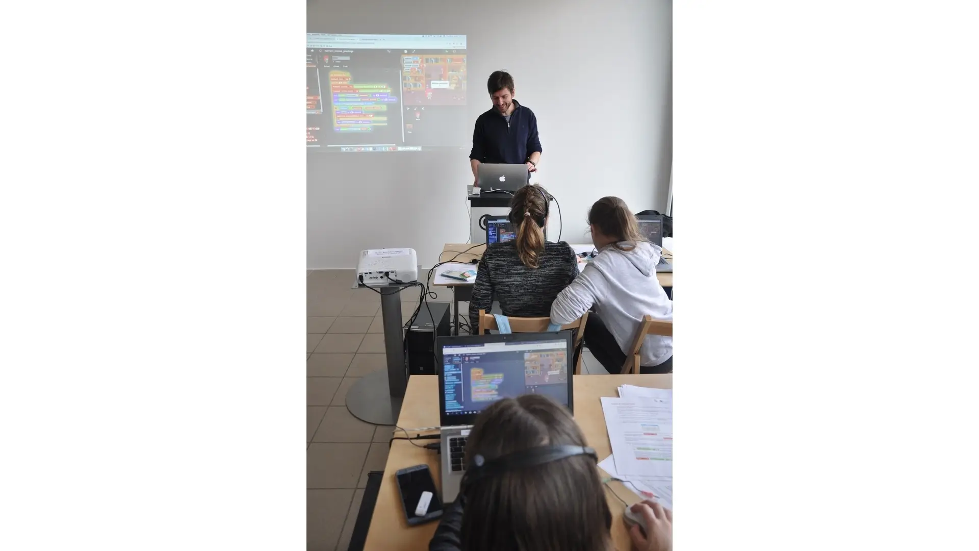 Slovenia’s informatics teacher education: balancing standards and realities